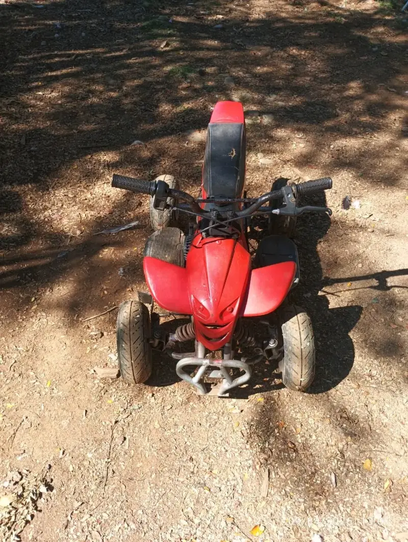 Mini cuatrimoto roja usada - 5