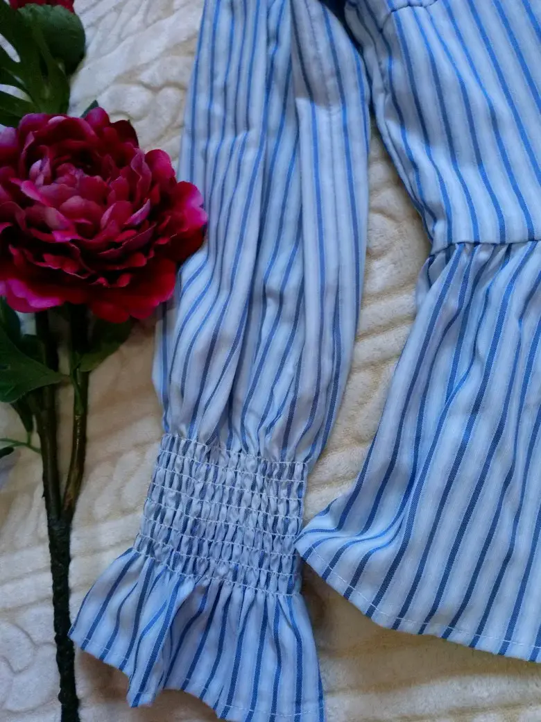 Blusa peplum rayada con hebillas - 4