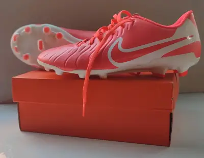 Zapatillas de fútbol naranjas c/ toperoles 26 Cm. - miniatura 1