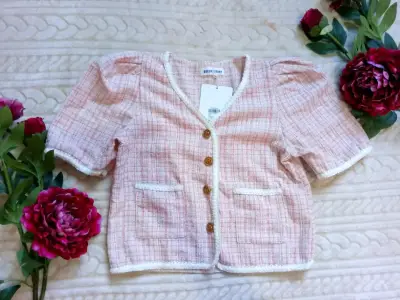 Blusa rosada de tela tejida - miniatura 1