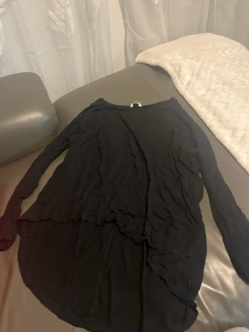 Blusa negra larga