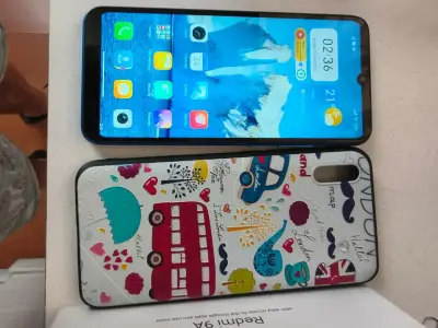 Smartphone Xiaomi Redmi 9A con funda - miniatura 1