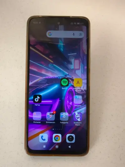 Celular Xiaomi Redmi 12 con carador ycaja original - miniatura 1