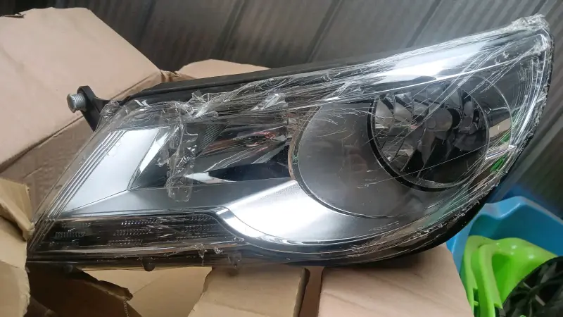 Óptico izquierdo para tiguan 2009 al 2011 - 1
