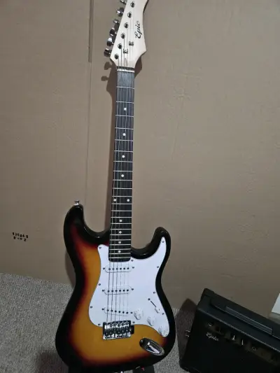 Guitarra eléctrica nuava con amplificador - miniatura 1