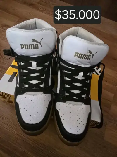 Zapatillas Puma blancas y negras - miniatura 1