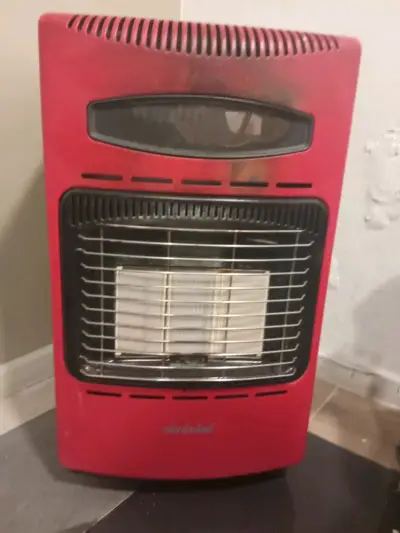 Calefactor eléctrico rojo pequeño - miniatura 1