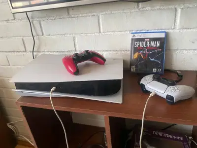 Consola PS5 con juego y controles - miniatura 1