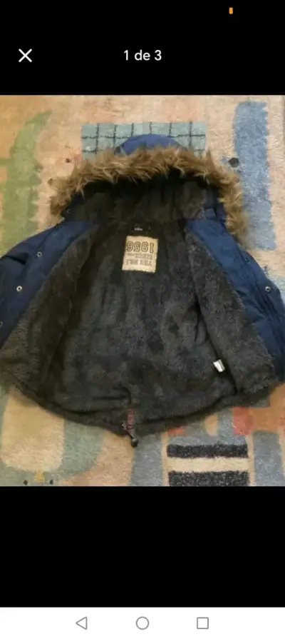 Chaqueta azul con capucha - miniatura 2