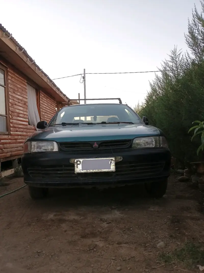 Auto Mitsubishi Lancer - 1