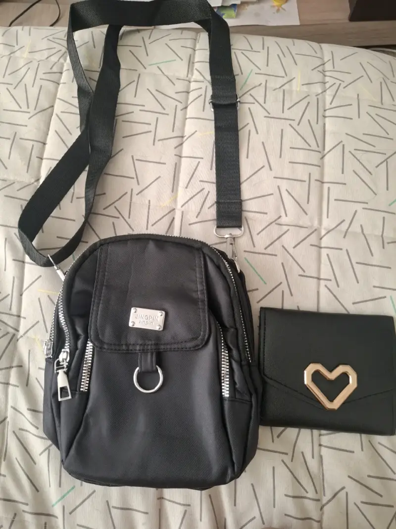 Mochila negra compacta con bolso - 2