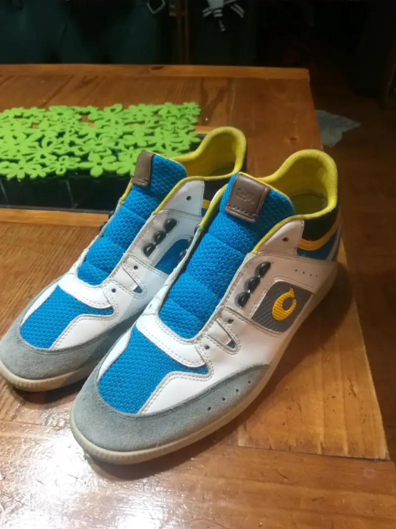 Zapatillas deportivas azul y blanco marca coach - 1
