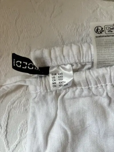 Pantalones blancos de lino - miniatura 2
