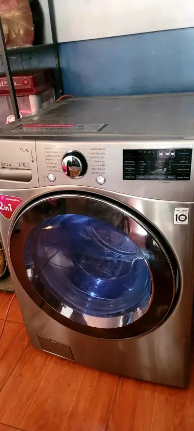 Lavadora secadora LG 20 kilos acero inoxidable - miniatura 1