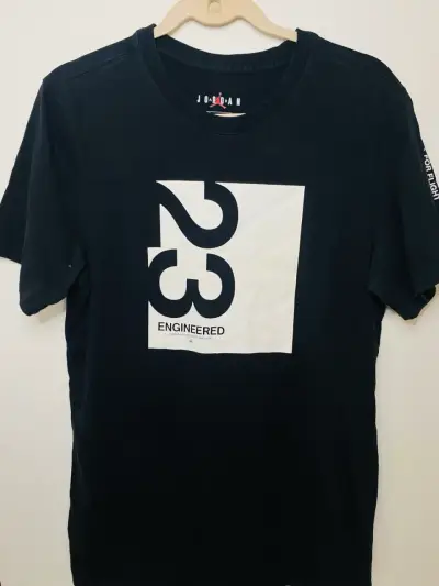 Polera negra Jordan 23 - miniatura 1