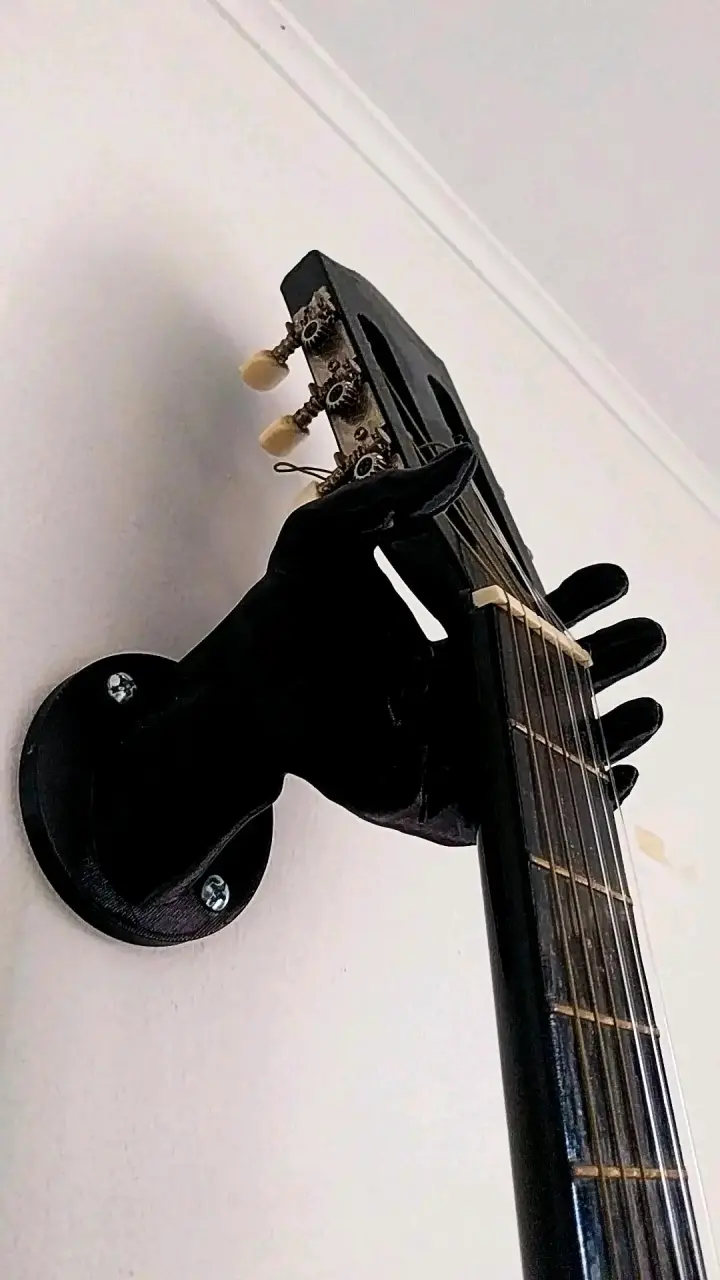 Soporte para pared  forma de mano - 1