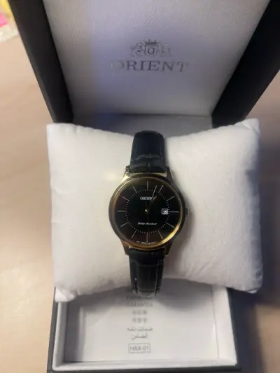 Reloj Orient dorado y negro - miniatura 1