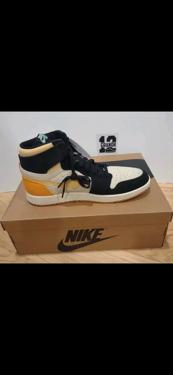 Zapatillas jordan 1 negro y amarillo
