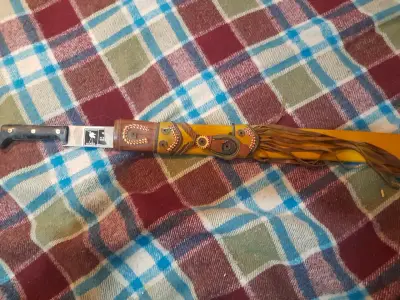 Cuchillo con funda artesanal - miniatura 1