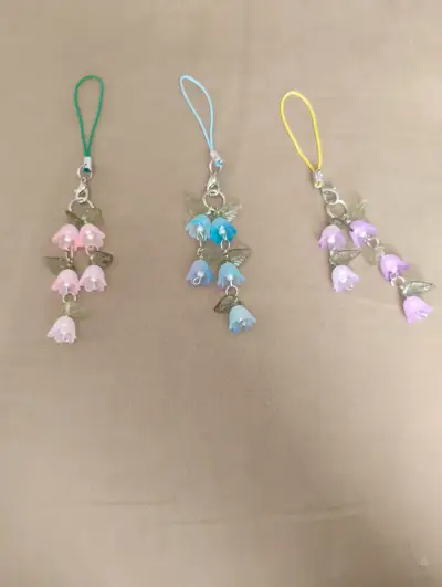 Pulseras y llaveros  florales coloridas - miniatura 2