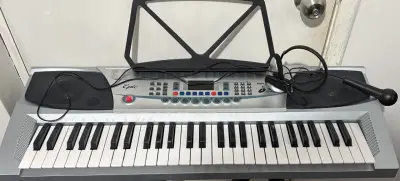 Teclado eléctrico con micrófono - miniatura 1