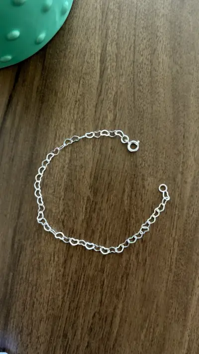 Pulsera de plata con dijes - miniatura 1
