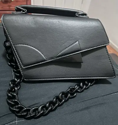 Cartera negra elegante - miniatura 1