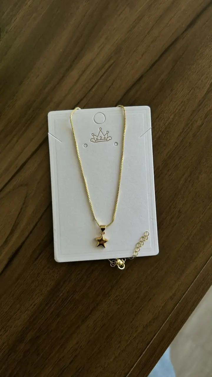 Collar dorado con colgante estrella - 2