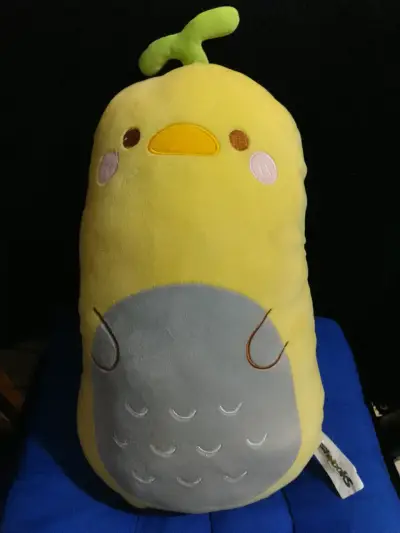 Peluche de pato con una plantita en la cabeza - miniatura 1