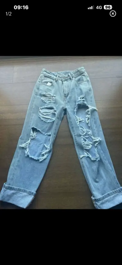 Jeans rasgados azul claro - miniatura 1