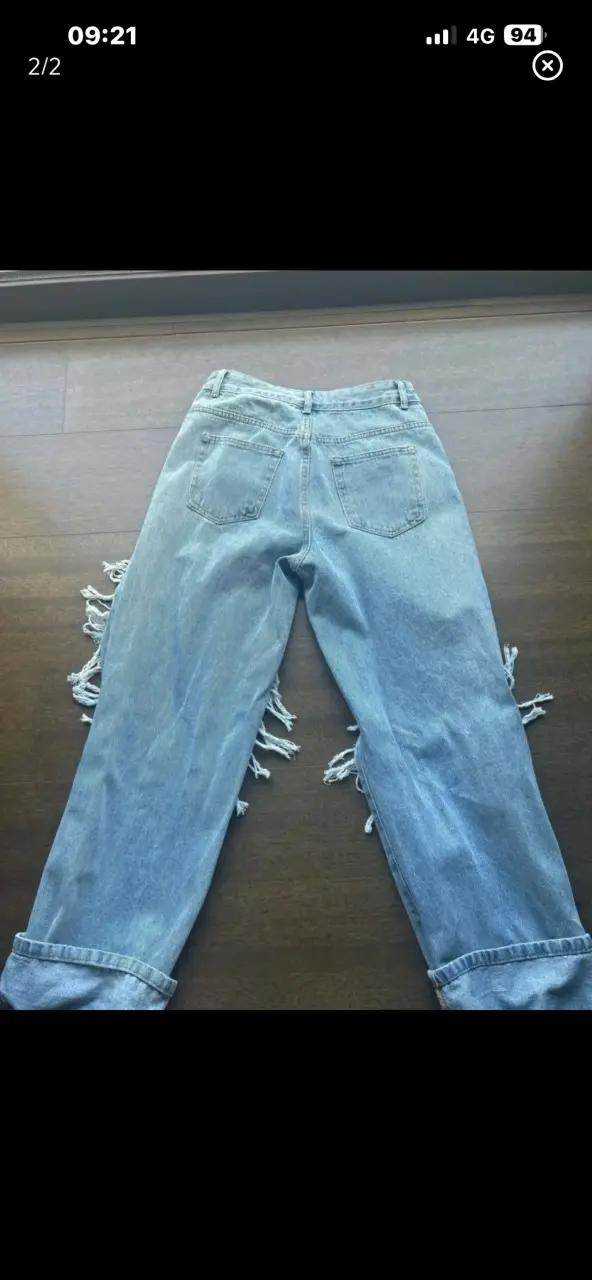 Jeans rasgados azul claro - 2