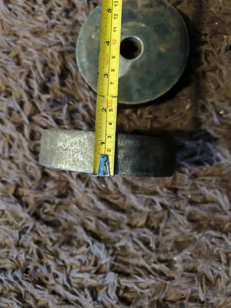 Disco de pesa metálico usado - 2