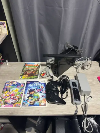 Consola Wii desbloqueada con juegos y accesorios - miniatura 1