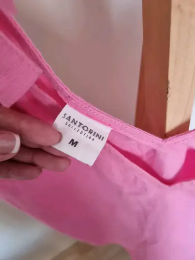 Blusa rosa con lazos - miniatura 2