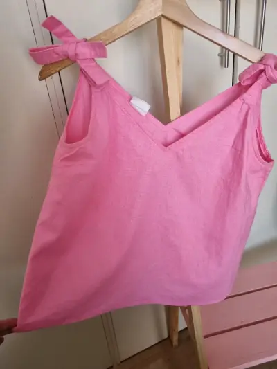 Blusa rosa con lazos - miniatura 3