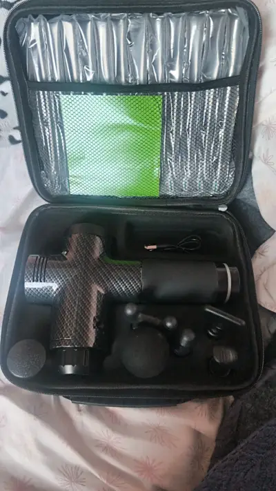 Pistola de masaje portátil - miniatura 1
