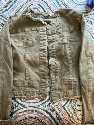 Chaqueta verde desgastada - miniatura 1