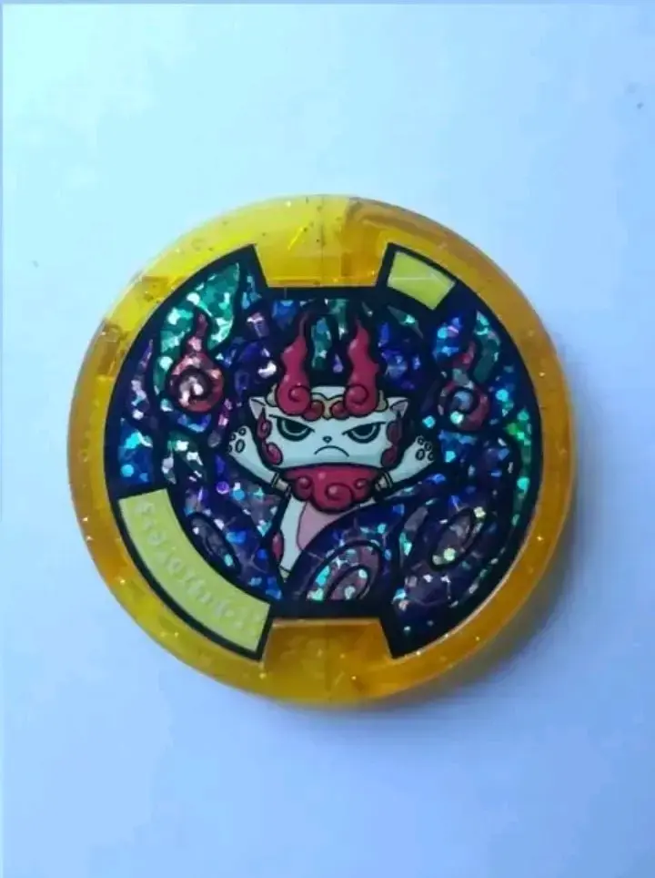 Medalla coleccionable Yo-kai Watch dorada. - 1