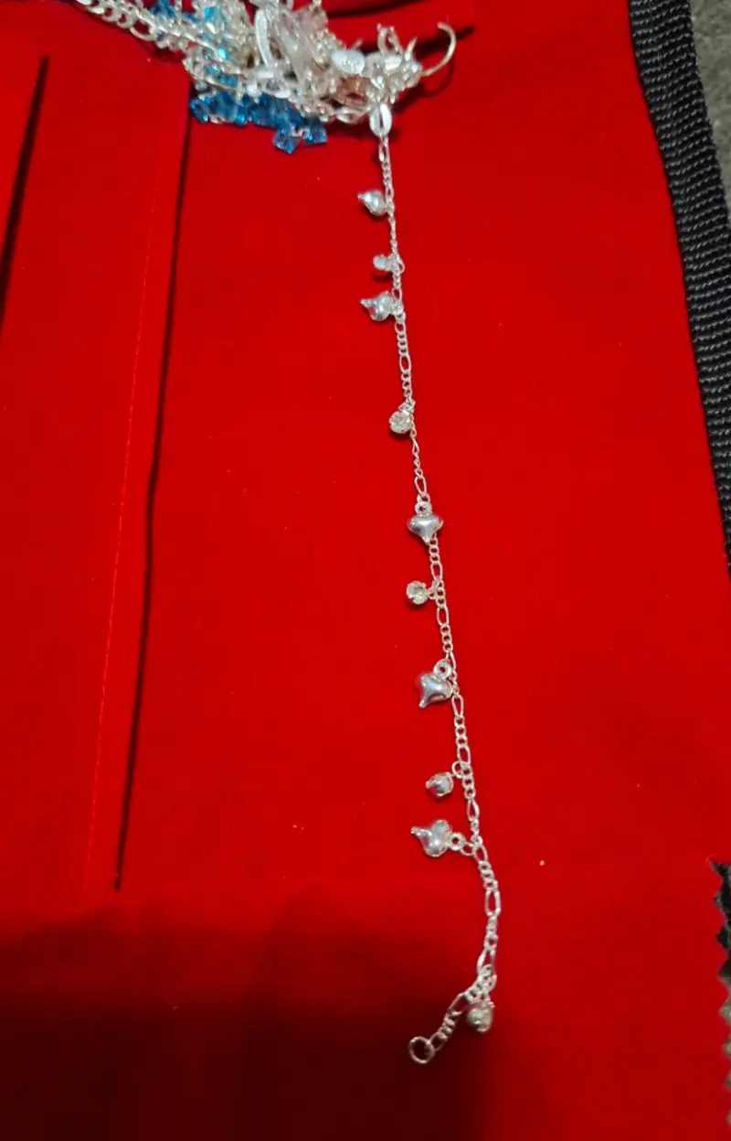 Pulsera de plata con dijes