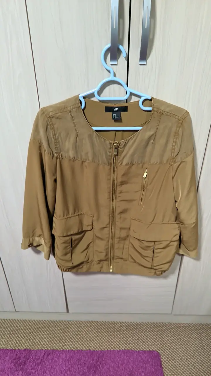 Chaqueta H&M café con bolsillos 36 - 1