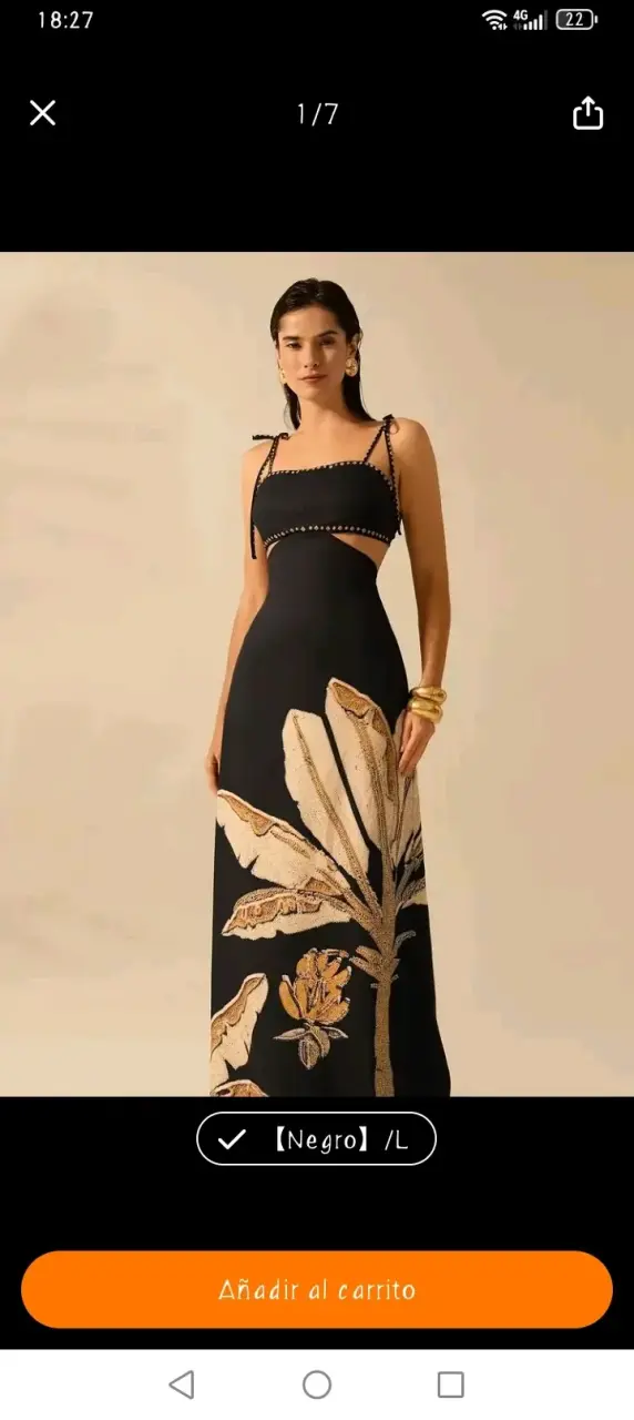 Vestido negro con estampado floral - 1