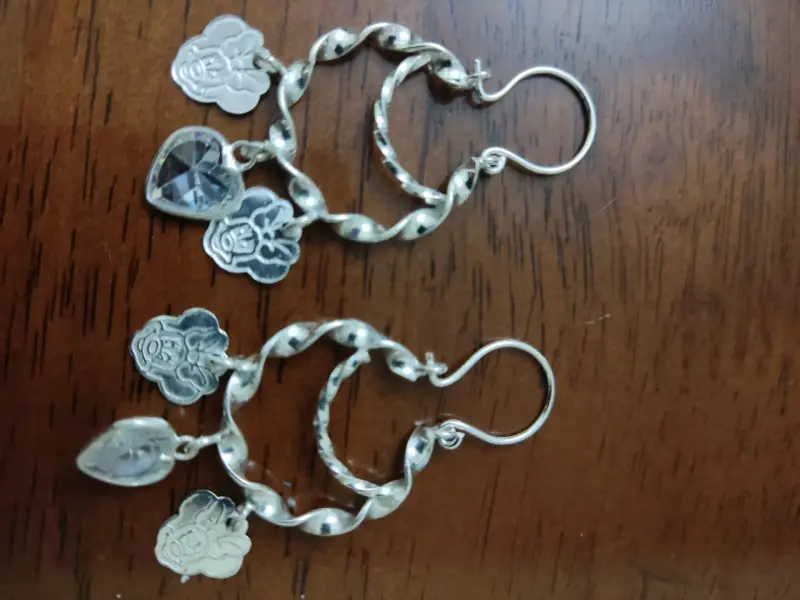 Aros colgantes de plata 925con detalles Minnie.