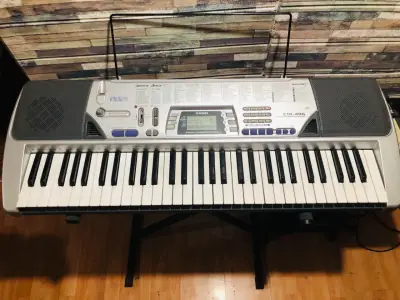 Teclado Casio CTK-496 con soporte - miniatura 1
