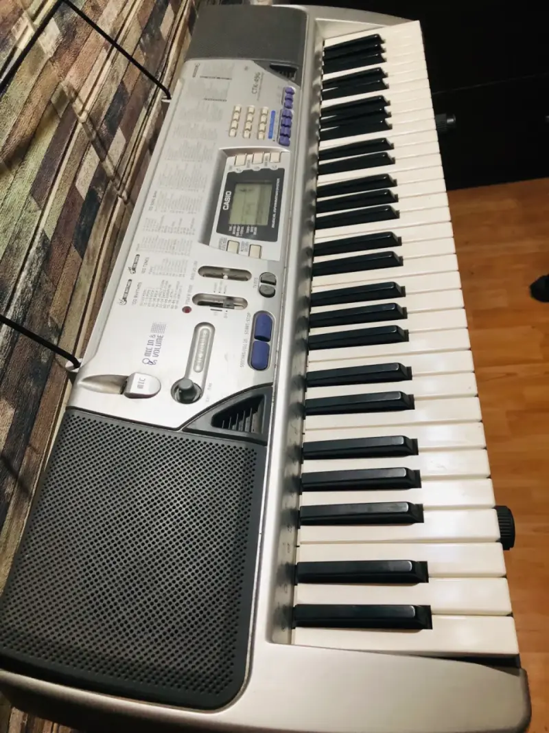 Teclado Casio CTK-496 con soporte - 2