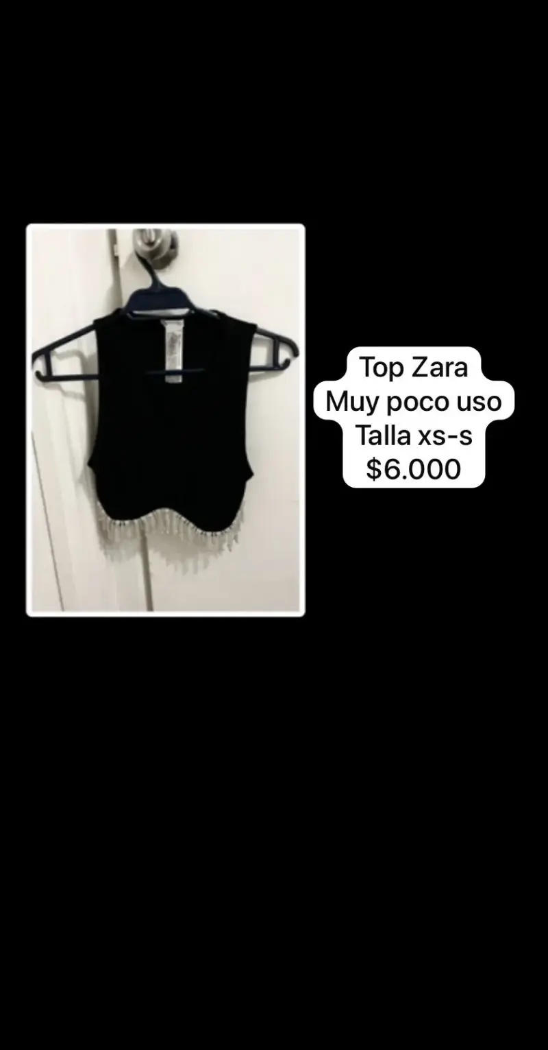 Top negro con flecos