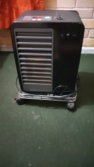 Calefactor portátil con ruedas - miniatura 1