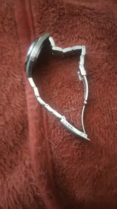 Reloj metálico plateado - miniatura 1