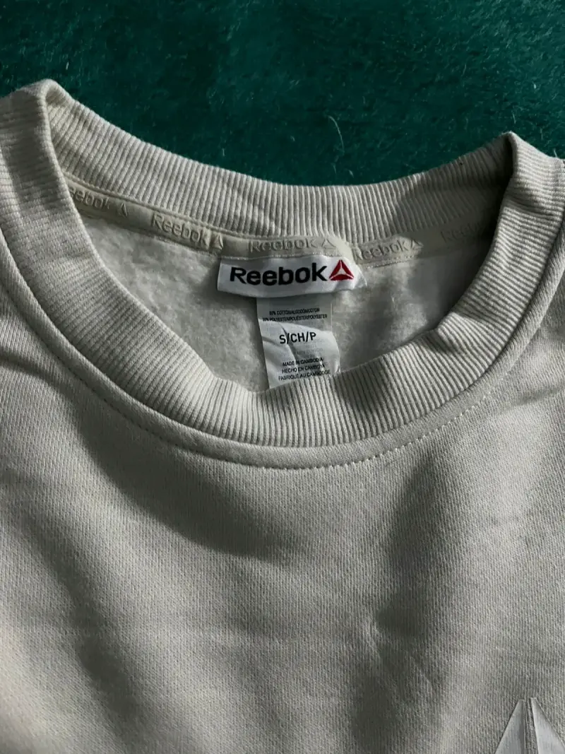 Polerón gris Reebok unisex - 4