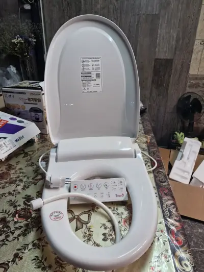 Asiento de inodoro con bidet eléctrico - miniatura 1