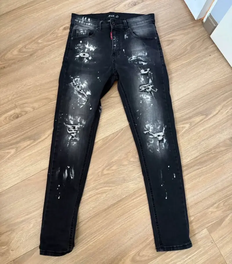 Jeans negros rasgados